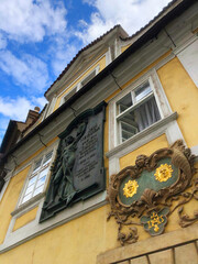 Gothic building facade with two gold suns