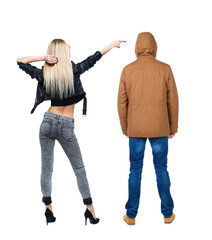 Canvas Print - Back view of two pointing girl in winter jacket.