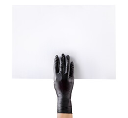 Wall Mural - Hand in black gloves holding blank cardboard isolated on white