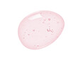  Hyaluronic acid serum texture. Pink liquid gel drop isolated on white. Cosmetic face skincare product with bubbles closeup