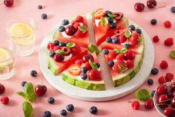 Wall Mural - watermelon pizza slices with yogurt and berries, summer dessert