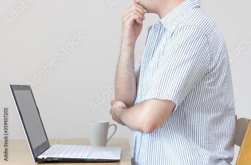 自宅で私服でノートパソコンで仕事をして考え事をしている男性 在宅勤務 副業のイメージ Buy This Stock Photo And Explore Similar Images At Adobe Stock Adobe Stock