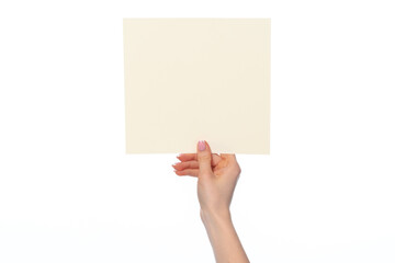 Poster - Woman's hand showing white paper banner isolated on white