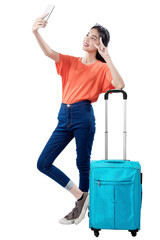 Sticker - Asian woman standing with suitcase making selfie