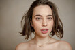 © Екатерина Мазур - A young beautiful girl with a natural appearance. A beauty portrait. Girl looks into the camera with tousled hair