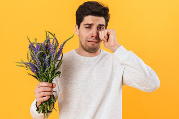 Sticker - Photo of unhappy man with allergy crying and posing with flowers