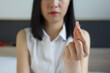 © Jirattawut - young woman taking pill,  taking drugs. Medicines at work