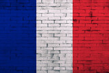 Fototapeta Paryż - France flag painted on an old brick white wall. texture scratched backdrop and concept of flag day. national symbol of independence has red, blue, white tricolor