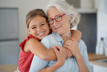 Portrait Of Smiling Grandmother With Grandkid