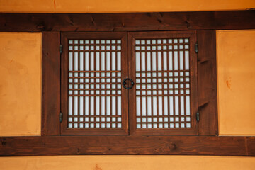 Wall Mural - Korean traditional wooden window and brown wall