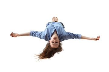 mid-air beauty cought in moment. full length shot of attractive young woman hovering in air and keep