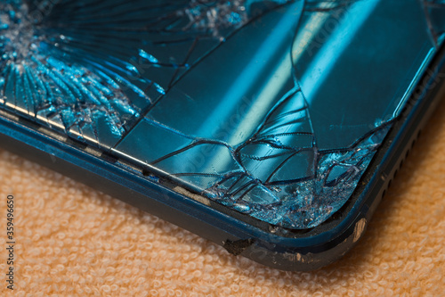 Fototapeta na szkło Broken case and touch phone display.
