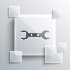 Grey Wrench spanner icon isolated on grey background. Square glass panels. Vector Illustration