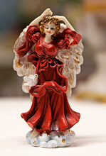 A Dancing Little Porcelain Figure In Red Dress