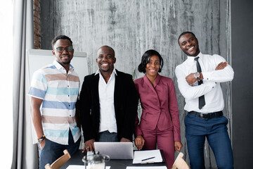 Portrait of office staff that his firm fight against racism and smile his work in the office