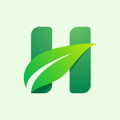 Ecology H letter logo with green leaf.