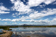 © Hall Jameson - Lake scene in Montana with reflections of dynamic blue skies with clouds
