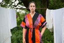 Woman In Colorful Jumpsuit With Clothesline  5