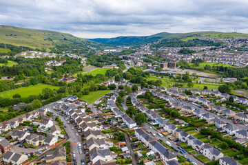 Poster - Aerial drone view of a residential area of a small Welsh town surrounded by hills (Ebbw Vale, South Wales, UK)