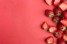 Tasty Ripe Strawberries On Red Background, Flat Lay. Space For Text
