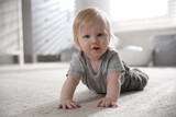 Fototapeta  - Adorable little baby on floor at home