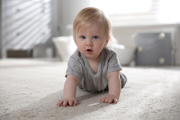 Wall Mural - Adorable little baby on floor at home