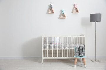 Poster - Cute baby room interior with modern crib