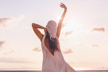 Wall Mural - beautiful young stylish woman outdoors at sunset