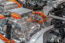 Close Up View Of Detailed Electric Car Engine And Spare Parts.