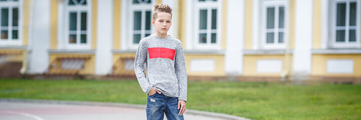 close up portrait of handsome boy teenager. panoramic view