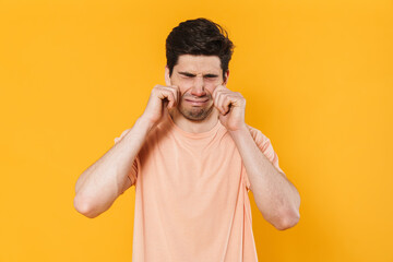 Poster - Photo of unhappy bristle man in basic t-shirt crying on camera