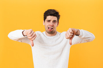 Poster - Photo of sick unhappy man showing thumbs down and his tongue