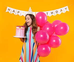 Poster - Image of excited woman posing with pink balloons and birthday torte