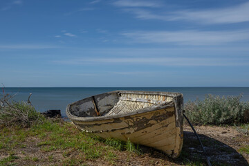 old fishing boat on the shore