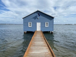 blue house on the water