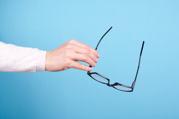 Canvas Print - Glasses in a hand.