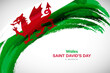 Happy saint davids day of Wales with watercolor brush stroke flag background
