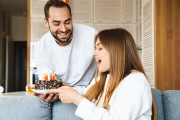 Sticker - Cheerful attractive young couple celebrating birthday