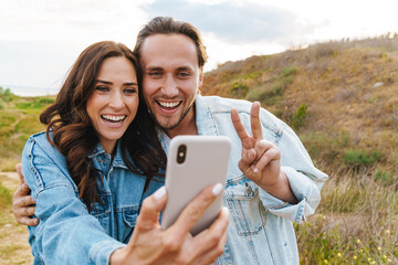 Sticker - Beautiful happy young couple in love spending time together