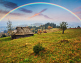 Fototapeta Tęcza - Rainbow over the Mountains. autumn morning in the Carpathians