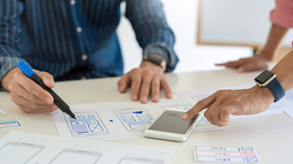 designer designing application development a prototype for mobile phone layout