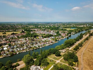 Thames river runs through the Thames Ditton and Hampton court, London