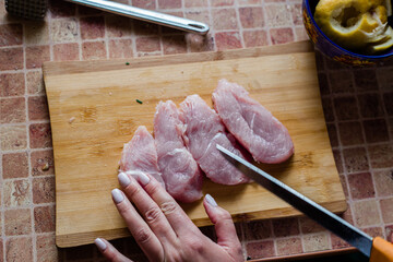 raw meat on a cutting board