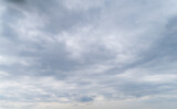 Fototapeta Na ścianę - Cloudy gray sky with thick dense clouds.
