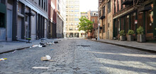 Empty View Of Crobsy Street Covered With Trash In The NoHo Neighborhood Of Manhattan In New York City
