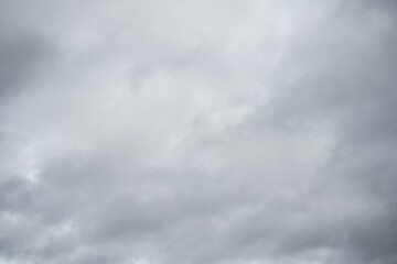 grey sky with white clouds in rainy season. beautiful grey and white sky background textures.