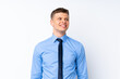 © luismolinero - Young handsome businessman laughing and looking up
