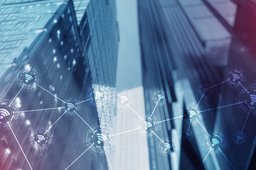 Wall Mural - wi fi concept on blurred city background.