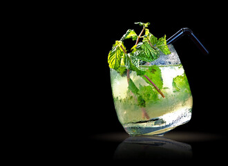 a glass of mojito isolated on black background with clipping path