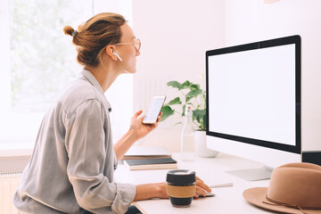 Wall Mural - Woman freelancer indoors home office concept.